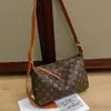 Bolsa de mano para desplazamientos transfronterizos, elegante y estilosa, bolso de alta gama para mujer 2026, gran capacidad, nuevo y versátil bolso de hombro y cruzado