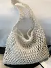 2026 Verano Nuevo Bolso de Hombro de Malla Hueca Estilo Coreano de Moda Bolso de Mano Tejido de Alta Moda para Vacaciones en la Playa