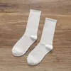 Vendas de fábrica outono novo meias femininas cor sólida meias empilhadas respirável absorventes de suor meias de cor sólida meias altas atacado