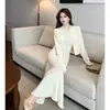 Traje estilo Chanel pequeño para mujer otoño manga larga top cintura ceñida manga vestido falda larga conjunto de dos piezas de punto temperamento