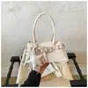 Elegante bolso de mano con estampado de leopardo para mujer, nueva colección 2026, diseño moderno y retro, adecuado para ir al trabajo en otoño e invierno, se puede llevar como bolso de hombro o bolso cruzado