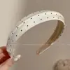 Faixa de cabeça larga de tricô minimalista e elegante estilo coreano para mulheres, novo modelo 2026, adequada para uso diário, projetada para realçar a aparência da linha do cabelo e pode ser usada como faixa de cabeça para lavar o rosto ou presilha de cabelo