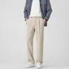 Ropa de Hombre Xintang / 2026 Primavera-Verano Nuevos Pantalones Casuales Ajustados Rectos Sueltos Estilo Coreano Modernos Versátiles para Hombre