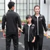 Novo Traje de Grupo para Jogos Esportivos de Primavera Traje Esportivo Masculino e Feminino Casaco de Treinador de Wushu Uniforme Escolar Personalizado Atacado