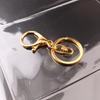 Venta al por mayor de fábrica, llavero, anillo, cadena, colgante de metal, accesorios, cierre de langosta, conjunto de tres piezas, accesorios de joyería DIY que conservan el color