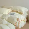 Juego de cuatro piezas de algodón 100% teñido en hilo de algodón lavado con diseño color block y costura overlock, funda nórdica transpirable de algodón puro estilo japonés, sábana y sábana bajera
