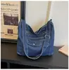 Bolso de hombro de moda estilo coreano 2026 nuevo de mezclilla versátil de gran capacidad cruzado para el trabajo y la escuela