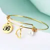 Pulsera Nueva Ajustable Amazon Transfronteriza Perla de Amor Acero Inoxidable 26 Letras Pulsera de Oro de 18K Venta al por Mayor para Mujeres