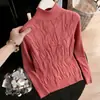 Foto real de top de punto de manga larga para mujer estilo europeo para otoño e invierno 2026 con cuello semi-alto y patchwork de malla