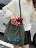 Bolsa de Grande Capacidade para Mulheres, Casual e Leve, 2026 Verão Portátil Versátil Bolsa para Estudante e Comutador, Bolsa de Ombro Moderna Estilo Coreano