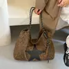 Bolso estampado de leopardo para mujer, nuevo modelo de otoño 2026, nicho de alta gama, bolso tote súper popular para el día a día, bolso de hombro de gran capacidad