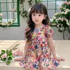 Vestido de Verão Pequeno Floral para Meninas Moda Infantil Celebridade da Internet Manga Bufante Saia Meninas Vestido Floral de Desenho Animado Estiloso
