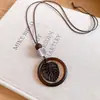 Colar com cordão de couro retrô e pingente oval, um acessório de moda luxuoso e estiloso, perfeito para combinar com suéteres, uma joia única e versátil para mulheres