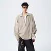 Camisa de moda de otoño para hombre, diseño de dos piezas falso con cuello alto, manga larga, cuello en V, camisa casual versátil holgada