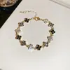 Pulseira de Trevo de Quatro Folhas Flor com Strass Transfronteiriça Europeia e Americana Simples Moda Exquisita Pulseira Retrô Toque de Luxo Leve Joia para Mãos