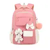 Nueva mochila transfronteriza para estudiantes de primaria, lindo conjunto de tres piezas con lazo, mochila escolar para niñas, gran capacidad, mochila reductora de peso