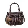 Mochila plisada de gran capacidad, elegante y texturizada para mujer, nuevo bolso de hombro retro y chic 2026