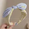 Diadema de lujo ligero sintiendo presión ambiente para el cabello diadema cara femenina accesorio para el cabello de lazo estilo retro Hong Kong pinza para el cabello tocado de alta gama