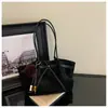 Bolso tote de acabado mate transfronterizo, bolso de hombro de gran capacidad para mujer, bolso de mano de alta gama, nicho, estilo vintage, y bolso de axila