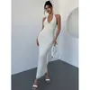 Toma Real de un Nuevo Estilo de Verano para Mujer en Comercio Exterior: Vestido largo ajustado de cuello en V texturizado, romántico y elegante