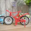 Tienda de 10 yuanes suministro reloj al por mayor lindo de mesa bicicleta despertador regalos de empresa