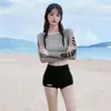 Traje de baño para mujer Estilo deportivo Sexy Adelgazante Cintura alta Cubre abdomen Manga larga Malla Exterior Dividido Conjunto de tres piezas Venta al por mayor