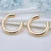 Novedad Pendientes estilo europeo y americano en forma de C color dorado claro pendientes de aguja de plata versátiles de alta calidad pendientes de anillo liso simples joyería para orejas