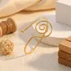 Nuevo brazalete de palma espiral de moda retro transfronterizo europeo y americano, pulsera de palma punk, pulsera de cadena de serpiente con borla, joyería