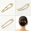 Pasador de aleación en forma de U transfronterizo con un diseño de moño de lujo ligero, accesorio para el cabello de alta gama para mujeres de estilo europeo y americano, pasador dorado y plateado