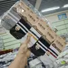 Calcetines de algodón para hombre y mujer moda deportiva calcetines de algodón exquisitos en stock al por mayor