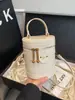 Mochila Retro Texturizada Nueva y Elegante para Mujer, Bolso de Hombro Cruzado de Verano a la Moda, Bolso de Mano Moderno, Forma Cilindro Versátil