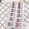 Versión coreana de accesorios para el cabello con tocado, mini pinza pequeña para flequillo, pinza de garra de diamante, suministro de tienda al por mayor de 2 yuanes
