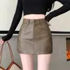 Falda Corta de Cuero PU Estilo Picante Retro para Mujer Primavera Otoño 2026 Nueva Cintura Alta Adelgazante Anti-exposición Línea A Ceñida a la Cadera
