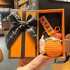 Caja de regalo de combustible para el examen de ingreso a la universidad para ganar el primer llavero de girasol bolsa colgante de bolsa para enviar a los estudiantes regalo de graduación