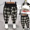 Ropa infantil Zhao Yi 2021 Invierno nuevo estilo coreano niños y niñas Pantalones de pana a cuadros de una pieza para niños D1611
