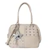 Bolso de hombro de moda nicho coreano, bolso tote retro casual con tachuelas para chica popular, nuevo bolso de gran capacidad Henggeng para debajo del brazo