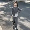Conjunto de ropa para niñas 2026 estilo nuevo, el conjunto popular de estilo coreano de este año para chicas de secundaria, suéter de otoño para niñas