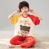 Pijama de Menino 2026 Verão Manga Curta Calça Longa Algodão Puro Novo Estilo Alunos do Ensino Fundamental Meninos Desenho Animado Gola Redonda Conjunto de Roupas para Casa