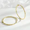 Pendientes de botón para oreja de diseño circular de nicho de lujo ligero de moda, pendientes de hebilla para el lóbulo de la oreja, temperamento femenino