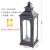 Estilo europeo hierro retro romántico adornos de candelabro lámpara de viento a prueba de viento de pie soporte para velas accesorios de boda linterna guía de camino