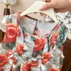 Vestido Sem Manga para Meninas 2026 Verão Novo Estilo Vestido Princesa Estampado Infantil Vestido de Sol de Praia para Crianças de 1 a 7 Anos
