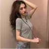 Camiseta de Manga Corta de Color Sólido con Cuello Redondo a la Moda para Mujer 2026 Verano Nuevo Estilo Coreano Top de Exportación Manga Larga Venta al por Mayor Transfronteriza