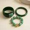 Conjunto de tres piezas de pulseras de acrílico con cuentas degradadas de resina vintage europeo y americano, pulseras de declaración de nicho de alta gama transfronterizas de segunda mano