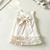 Vestido Infantil Verão Novo Estilo Europeu e Americano com Laço e Pedrarias Sem Mangas Barra com Babados Atacado
