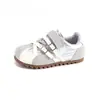 Zapatillas de entrenamiento alemanas para niños 2026 primavera y otoño nuevas zapatillas deportivas de suela plana, zapatillas versátiles casuales con hebilla y colores contrastantes, estilo Forrest Gump