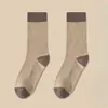 Calcetines marrones otoño e invierno para mujer de media pantorrilla calcetines de rizo retro japoneses calcetines de confinamiento estilo Mori college calcetines sin costuras