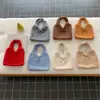 Bolso de punto de lana estilo coreano para otoño e invierno con correa de amarre, adecuado para el trabajo, gran capacidad, nicho, bolso de hombro versátil