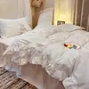 Corazón de niña rosa puro algodón lavado juego de cuatro piezas estilo princesa encaje de hoja de loto funda de edredón sábana bajera falda de cama juego de tres piezas para dormitorio