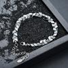 Pulsera de Piedras Biliares Negras Diamante Lujo Ligero Nicho Sentido del Diseño Costuras Alto Sentido Hip Hop Frío Moda Accesorios de Pulsera