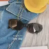 Populares de Venta Caliente Retro Y2K Gafas de Sol con Montura Ovalada para Mujer con Protección Solar y Aspecto de Alta Gama Tendencia de Disparo Callejero de Expertos de Xiaohongshu